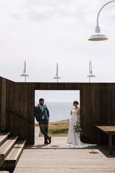 bride and groom on beach