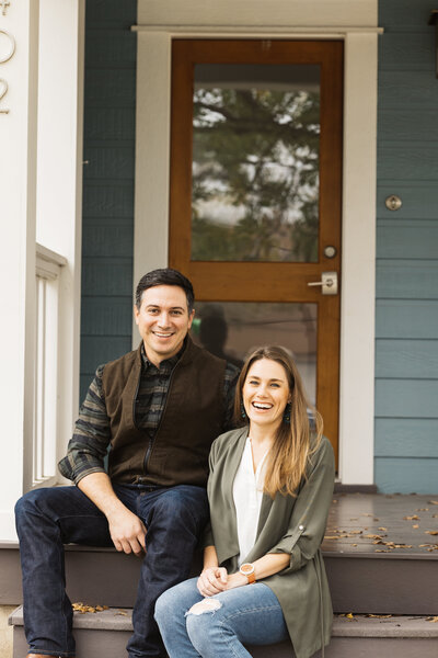 jonathan and lauren ramirez founders of housemill design. couple sitting on porch in austin texas. best interior designer in texas hill country.