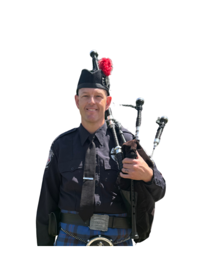 Scott Abraham, Pipe Major of Local 935 Pipes and Drums, stepping strong, shaking it off, and rounding up the madness one parade at a time.