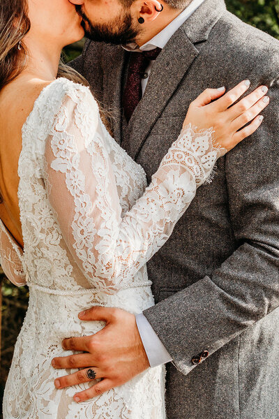 Bride and groom embrace