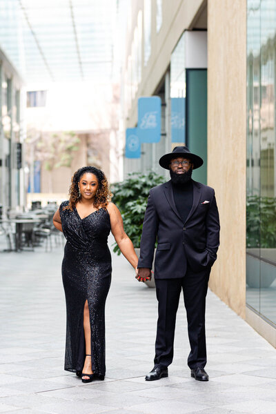 Black engaged couple in Uptown Charlotte