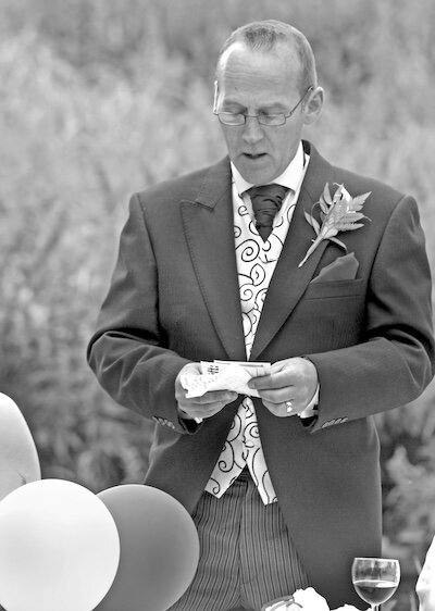 Man doing a custom wedding speech