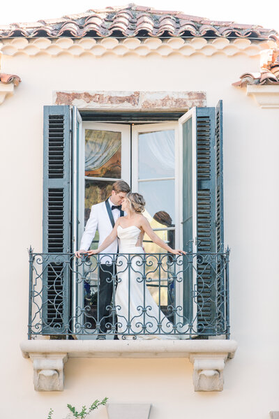 Groom kissing bride