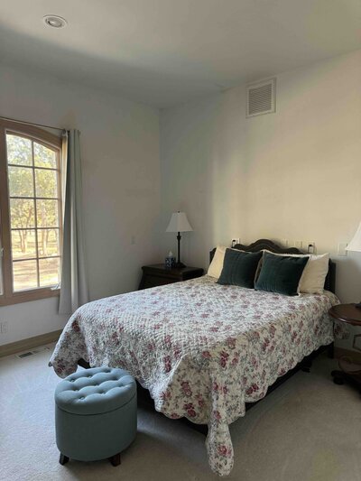 Ground view of a gorgeous stone chateau in a forest. 