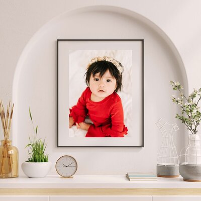 Springfield MO baby milestone photographer The XO Photography captures framed photo of baby girl in red