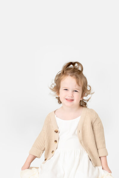 Portrait of Laura Stansberry, a St. Louis-based luxury photographer specializing in maternity and family photography.