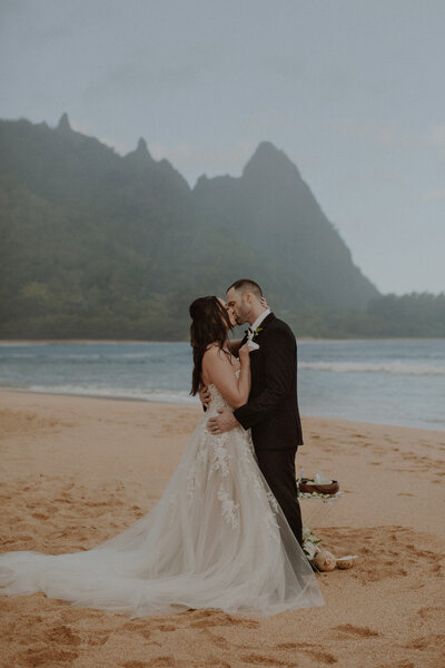 Bride and groom kiss during their Kauai elopement