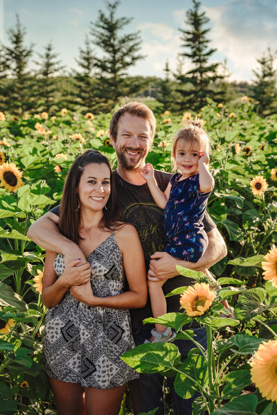 family in sunflower feild