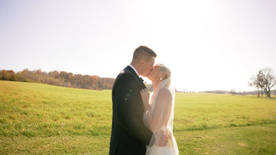 Couple Kisses In a Charlottesville Field