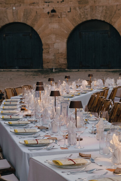Beautiful ceremony set up of chair with greenery