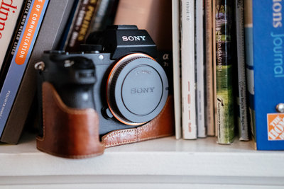 About San Antonio Photographer Expose The Heart Photography Irene Castillo and David Castillo camera on shelf in house