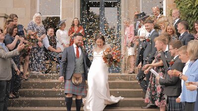 Confetti shot of couple at Netherbyres House