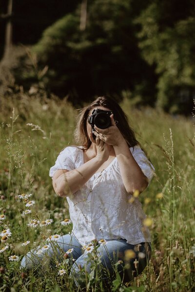 olivia holding camera