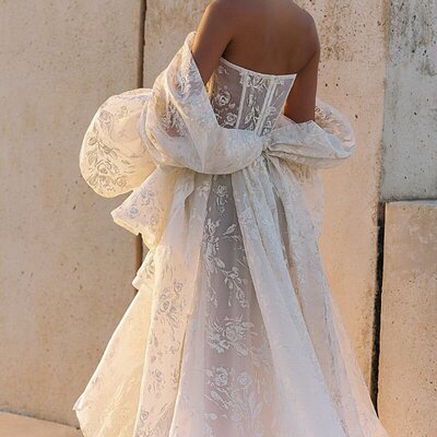 ballgown wedding dress with corset top and gloves