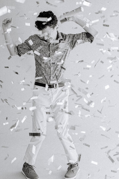 Josh dancing in confetti