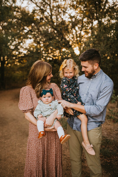 family of four at Murrell Park in Grapevine, TX