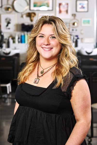 Headshot of Epoch Studio Salon's associate hair stylist, Angy