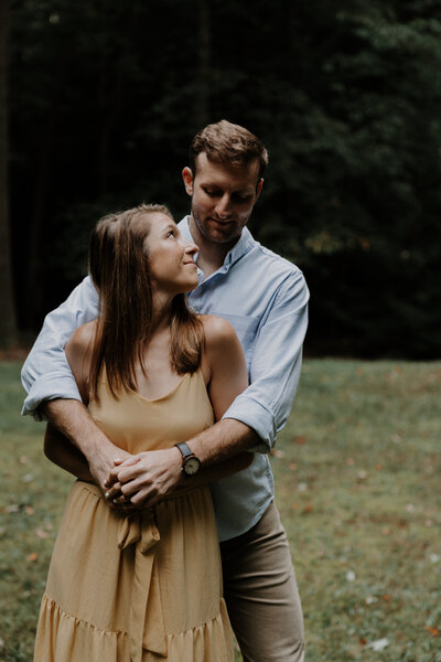 photo of couple in field