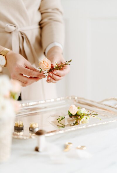 Wedding florist creating florals