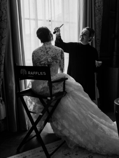 Bride in a bespoke Galia Lahav wedding dress and groom in a black tuxedo at The Arts Club, London, inspired by 90's supermodel style.