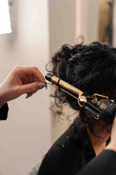 women getting hair styled