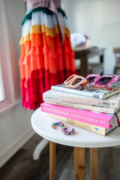 Styling books and accessories stacked on a table