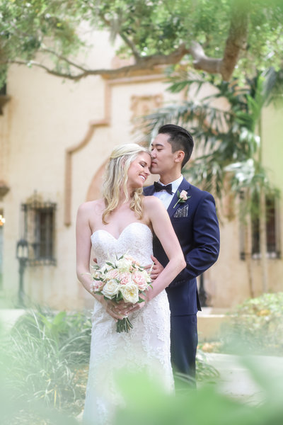 Bride and groom walk up memorial steps at their DC wedding