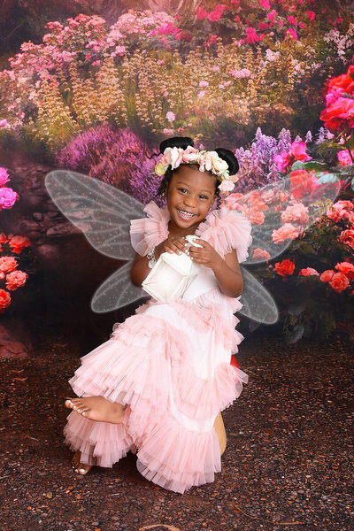 girl smiles at her enchanting fairy photoshoot