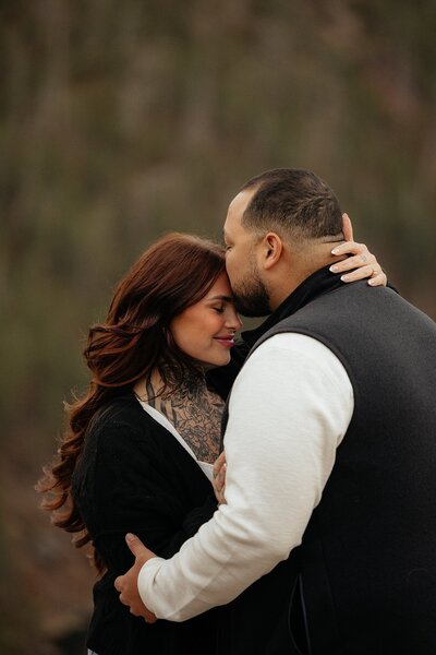 Dylan kissing Mollie's forehead in Rapid City.