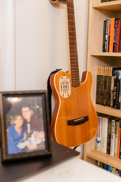 Detail shot of guitar and family frame by laure photography