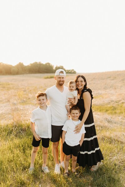 Co-founders and husband and wife team of Cornerstone Custom Builds with their 3 boys