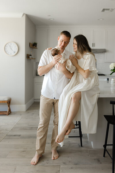 in home newborn session in kitchen pose