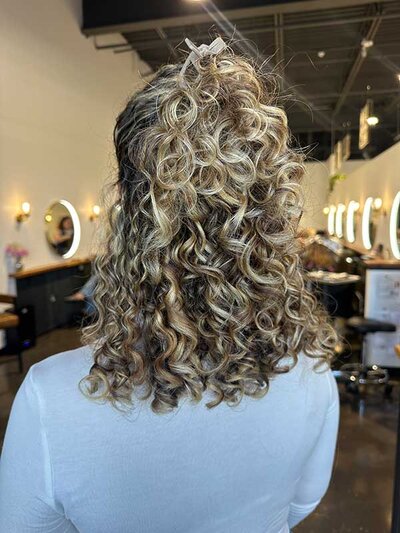 woman with curly hair highlights jacksonville, Florida