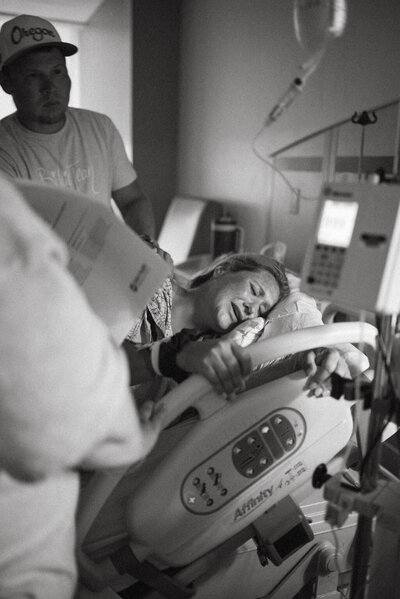 Birth photography by ZoeyLynn Photography capturing intimate moments of labor and newborn bonding