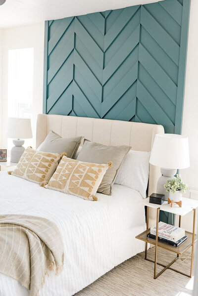 Bed and bedside cabinets arranged for interior design showcase in Utah.