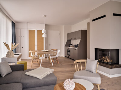 Wohnzimmer im Apartment Family Living with Fire im Hotel the breeze.