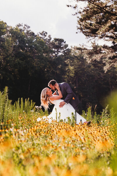 Couples portrait photography in wildflowers