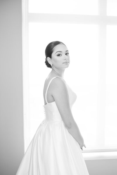 Bride posing in wedding dress at The Ritz-Carlton, Naples