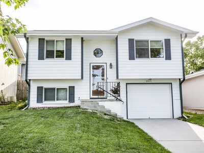 Elevation image representing Bold Beginning house plan  by Hartland Homes in Lincoln, NE