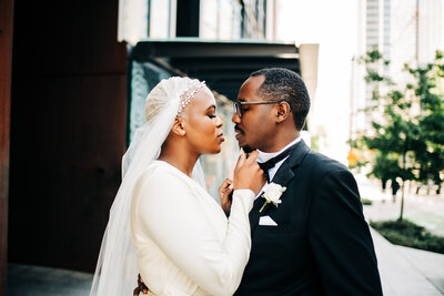 Black wedding couple poses on Seattle Street