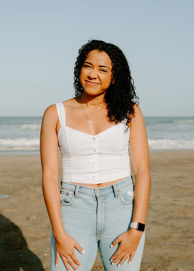 woman on beach smiling