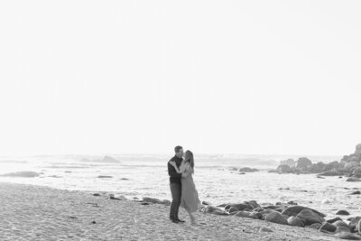 Black and white beach engagement photo