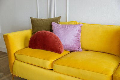 Yellow velvet couch