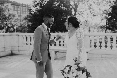 bride and groom holding hands