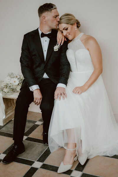 Photo of a first kiss at a wedding