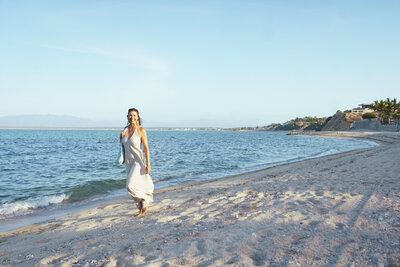 Milena smiling at beach