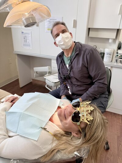 Dr. Leardi cleaning a patients teeth on their birthday. 