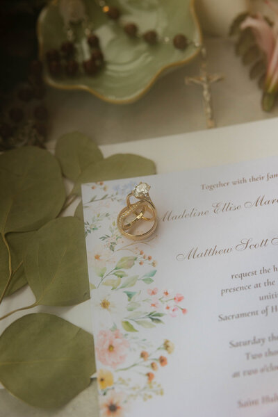 Faded photograph of a wedding invitation for a local couple in MN