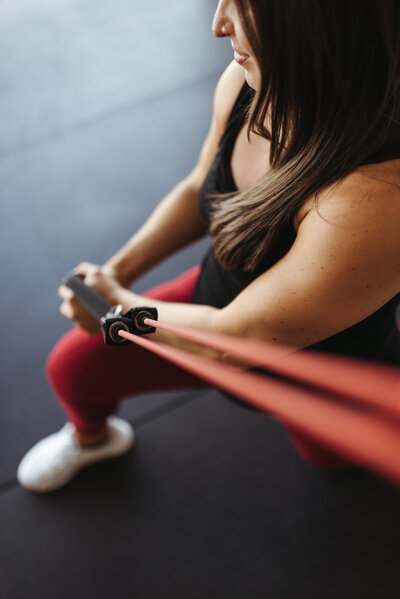 Fitness coach working out in Scottsdale garage for branding session
