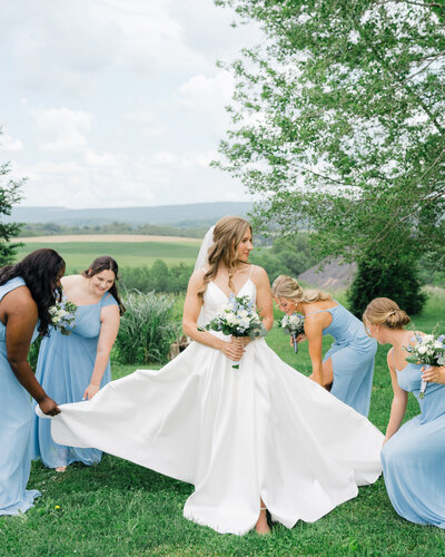 Bride with bridesmaids outdoor photography in Pittsburgh by Marien J Malloy